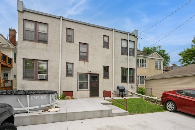 2545 Bryant Ave S Unit 1, Minneapolis, MN 55405 - view of front facade with stucco siding