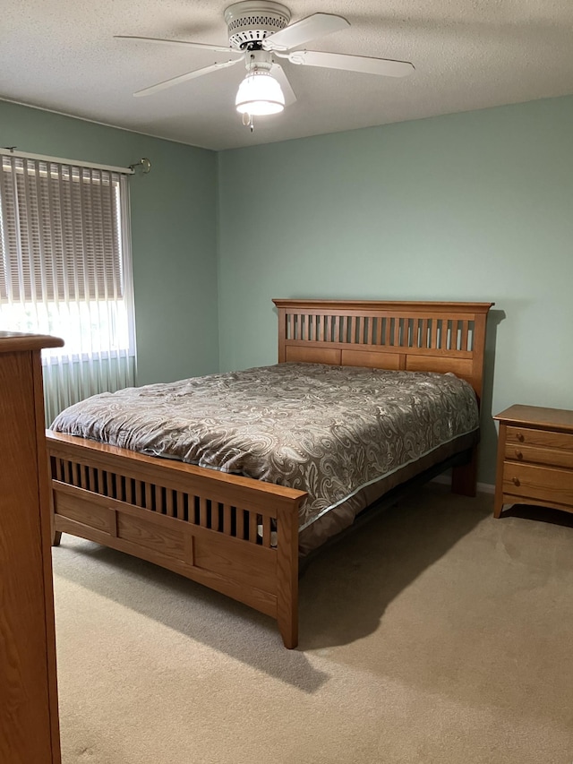 1332D Carriage Dr, Hudson, WI 54016 - bedroom with carpet floors and a ceiling fan