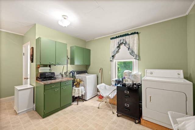 35746 585th Ave, Lafayette, MN 56054 - laundry room with washing machine and dryer, ornamental molding, and light flooring