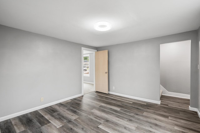 414 Western Ln, Anoka, MN 55303 - spare room with wood finished floors and baseboards