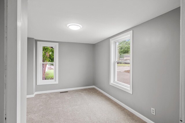 414 Western Ln, Anoka, MN 55303 - carpeted spare room with baseboards