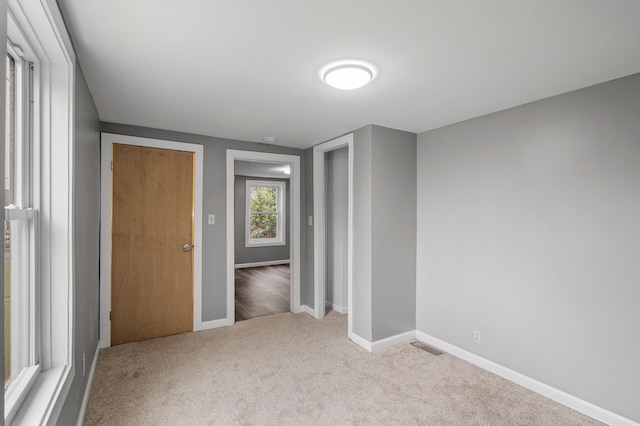 414 Western Ln, Anoka, MN 55303 - unfurnished bedroom with carpet floors and baseboards