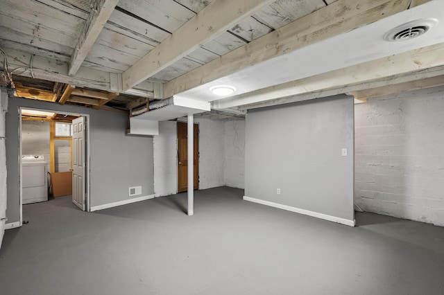 414 Western Ln, Anoka, MN 55303 - basement featuring washer / clothes dryer, baseboards, and concrete block wall