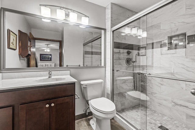 7582 Ojibway Park Bay, Woodbury, MN 55125 - full bathroom with vanity, a stall shower, ceiling fan, and wood finished floors