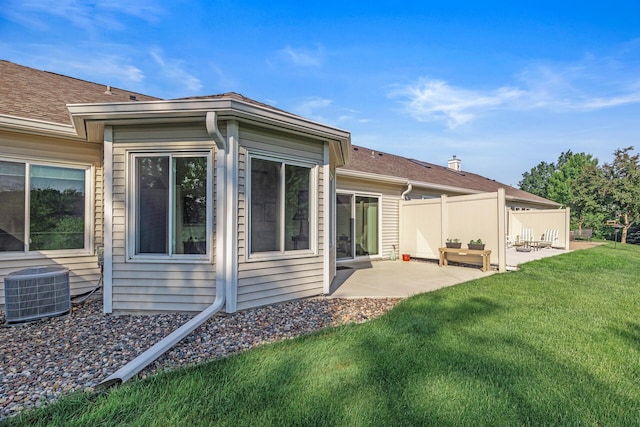 7582 Ojibway Park Bay, Woodbury, MN 55125 - back of house featuring a patio