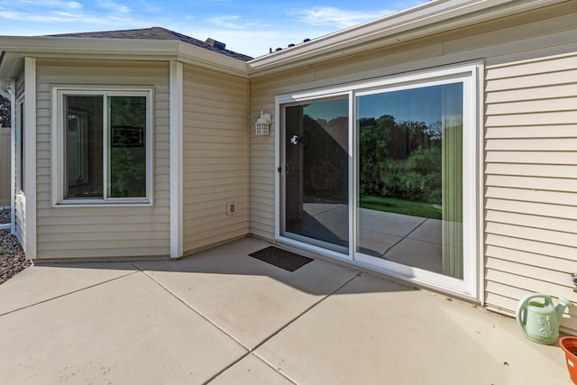7582 Ojibway Park Bay, Woodbury, MN 55125 - entrance to property featuring a patio