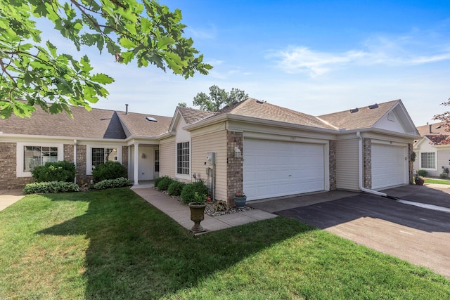 7582 Ojibway Park Bay, Woodbury, MN 55125 - ranch-style house with a garage, driveway, a front yard, and roof with shingles