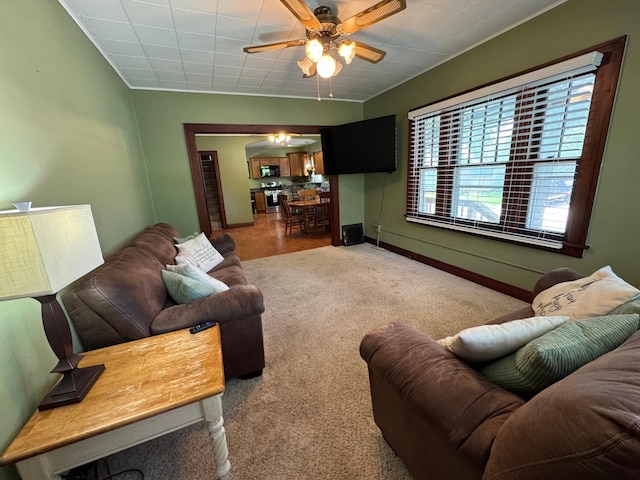 1315 Clark St W, Albert Lea, MN 56007 - living area featuring carpet, ceiling fan, and baseboards