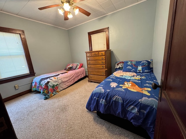 1315 Clark St W, Albert Lea, MN 56007 - carpeted bedroom featuring ornamental molding, a ceiling fan, and baseboards