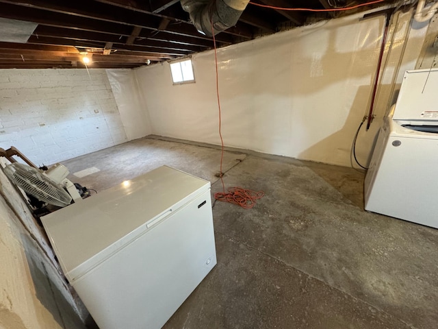 1315 Clark St W, Albert Lea, MN 56007 - basement featuring washer / dryer and fridge