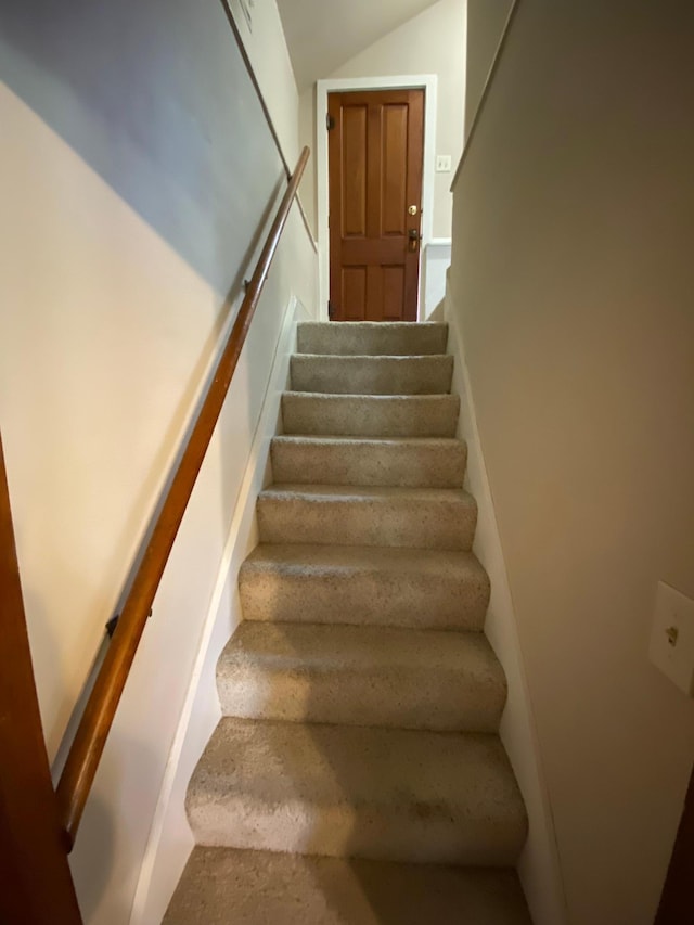 1315 Clark St W, Albert Lea, MN 56007 - staircase featuring vaulted ceiling