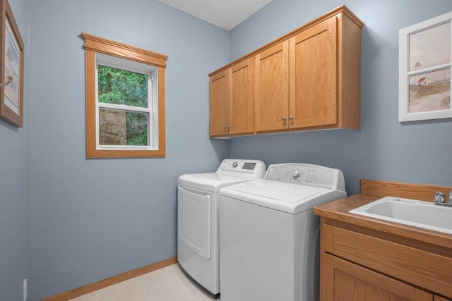 10426 Hidden Oaks Ln N, Champlin, MN 55316 - laundry area with cabinet space and separate washer and dryer