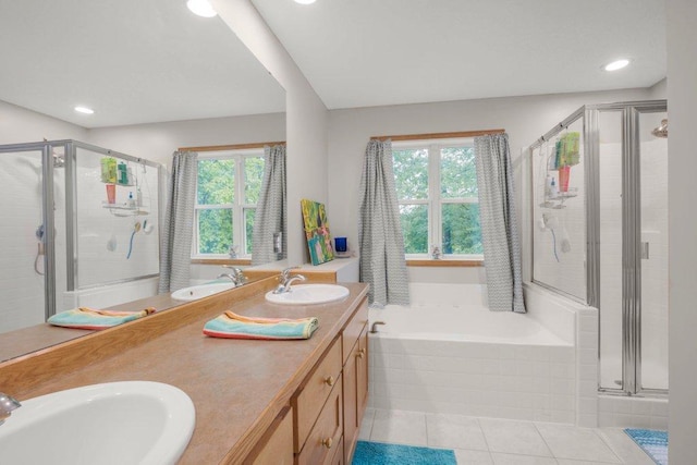 10426 Hidden Oaks Ln N, Champlin, MN 55316 - full bath featuring a stall shower, healthy amount of natural light, a garden tub, tile patterned flooring, and recessed lighting