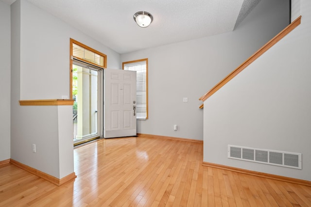 8280 Labont Way, Eden Prairie, MN 55344 - foyer with baseboards and light wood-style floors