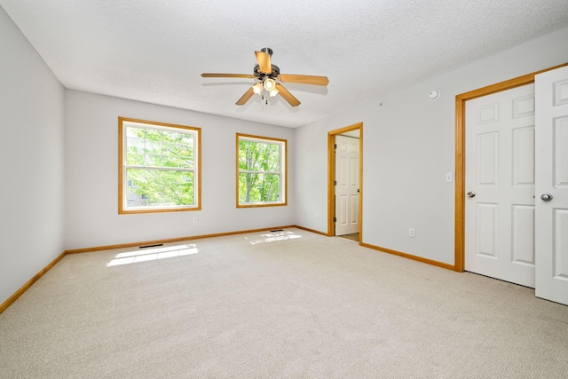 8280 Labont Way, Eden Prairie, MN 55344 - unfurnished bedroom with baseboards, carpet flooring, and a ceiling fan