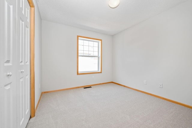 8280 Labont Way, Eden Prairie, MN 55344 - unfurnished bedroom featuring baseboards, carpet, and a closet