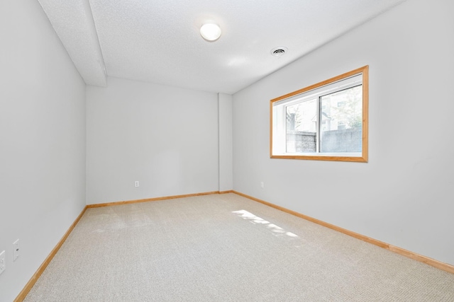 8280 Labont Way, Eden Prairie, MN 55344 - carpeted spare room with baseboards and a textured ceiling