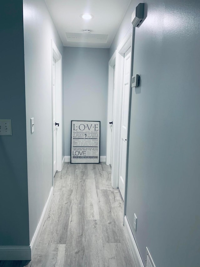 2120 Walden Blvd NW, Oak Grove, MN 55011 - hallway with wood finished floors and baseboards