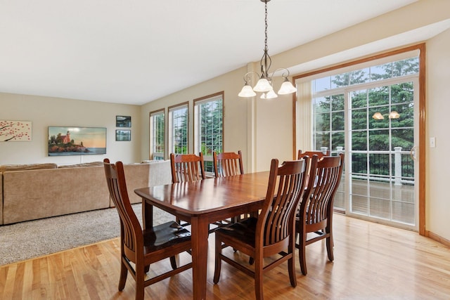 2097 138th St W, Rosemount, MN 55068 - dining area featuring light wood-style floors and a chandelier
