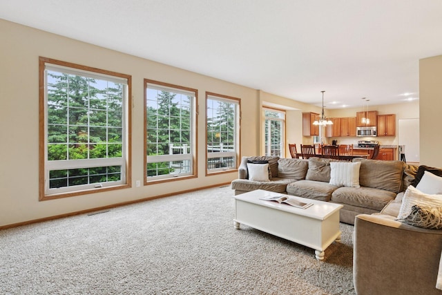 2097 138th St W, Rosemount, MN 55068 - living area featuring a chandelier and light colored carpet