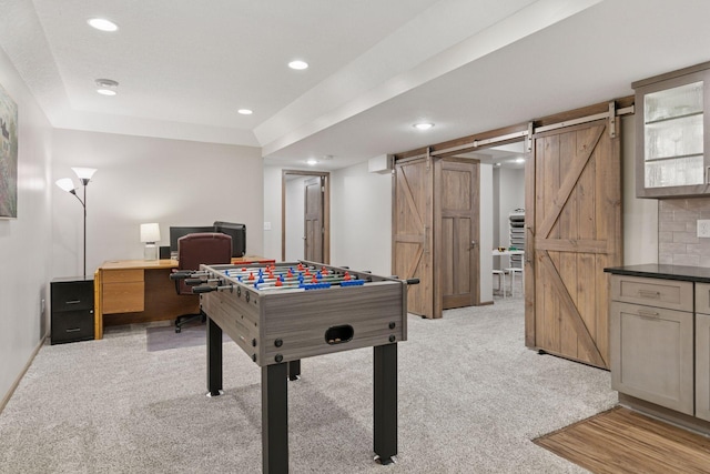2097 138th St W, Rosemount, MN 55068 - playroom with a barn door, light carpet, a desk, and recessed lighting