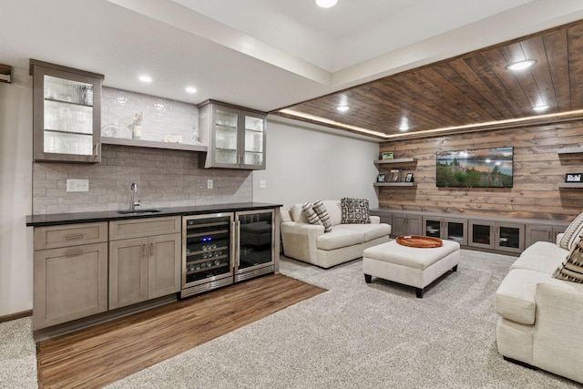 2097 138th St W, Rosemount, MN 55068 - indoor wet bar with wine cooler, carpet flooring, backsplash, wooden walls, and wooden ceiling