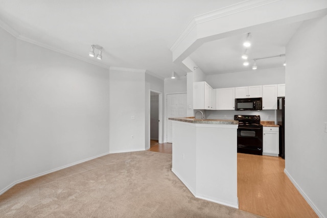13560 Technology Dr Unit 1102, Eden Prairie, MN 55344 - kitchen with black appliances, white cabinets, crown molding, track lighting, and baseboards