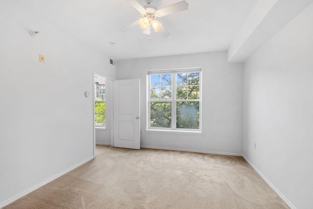 13560 Technology Dr Unit 1102, Eden Prairie, MN 55344 - empty room with carpet floors, baseboards, and a ceiling fan