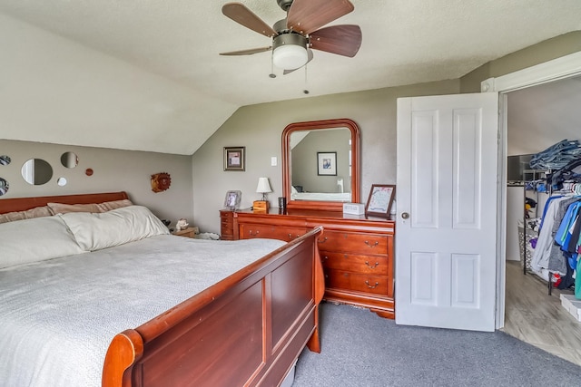 1782 225th St N, Hawley, MN 56549 - carpeted bedroom featuring vaulted ceiling and a ceiling fan