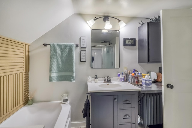 1782 225th St N, Hawley, MN 56549 - bathroom with radiator heating unit, vanity, a garden tub, vaulted ceiling, and an enclosed shower