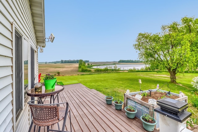 1782 225th St N, Hawley, MN 56549 - wooden deck with a water view and a yard