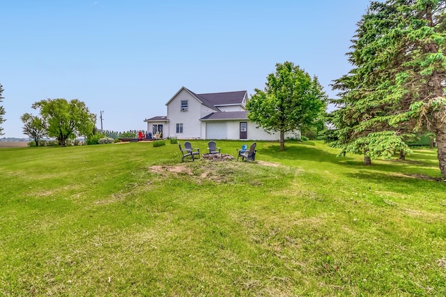1782 225th St N, Hawley, MN 56549 - view of green lawn with an outdoor fire pit