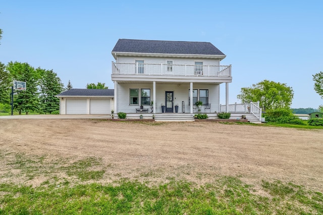 1782 225th St N, Hawley, MN 56549 - view of front of property with a porch, dirt driveway, and a balcony