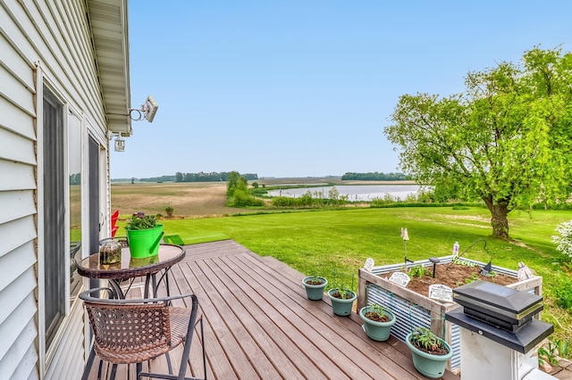 1782 225th St N, Hawley, MN 56549 - wooden terrace featuring a water view and a lawn