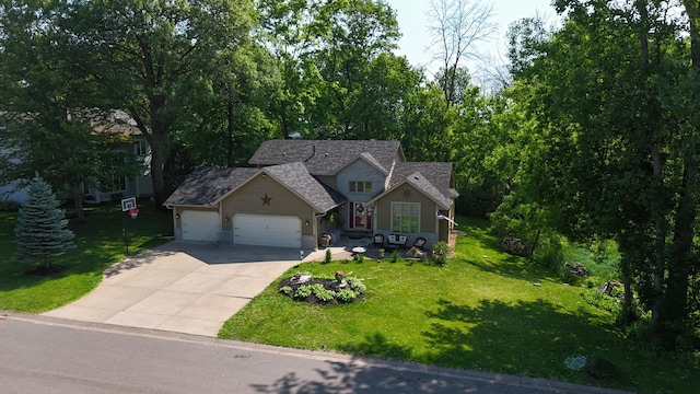 21857 Iden Avenue Pl N, Forest Lake, MN 55025 - view of front of property featuring an attached garage, concrete driveway, and a front yard