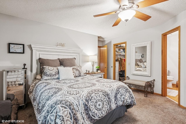 21857 Iden Avenue Pl N, Forest Lake, MN 55025 - bedroom with carpet, a walk in closet, a closet, baseboards, and connected bathroom