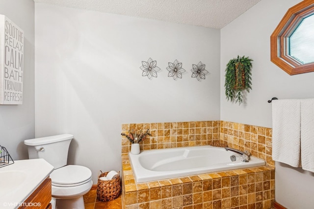 21857 Iden Avenue Pl N, Forest Lake, MN 55025 - full bathroom with a garden tub, vanity, toilet, a textured ceiling, and tile patterned flooring