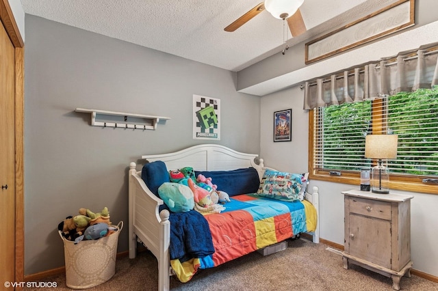 21857 Iden Avenue Pl N, Forest Lake, MN 55025 - carpeted bedroom featuring a textured ceiling, a ceiling fan, and baseboards