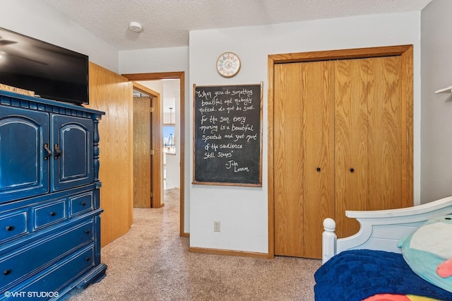 21857 Iden Avenue Pl N, Forest Lake, MN 55025 - bedroom featuring carpet floors, a closet, and a textured ceiling