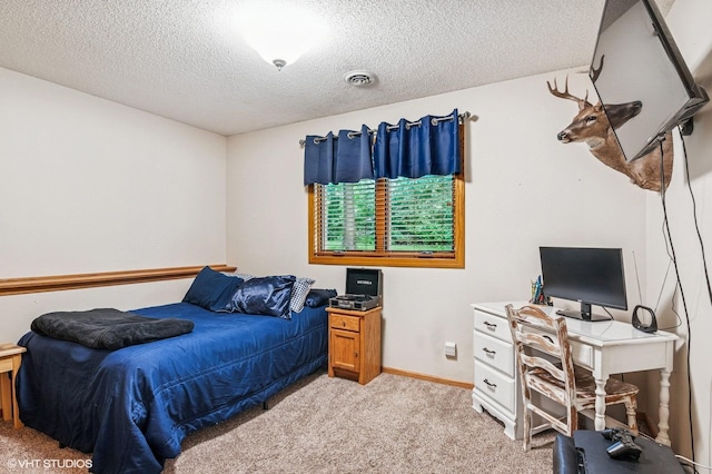21857 Iden Avenue Pl N, Forest Lake, MN 55025 - bedroom with light carpet, a textured ceiling, an office area, and baseboards
