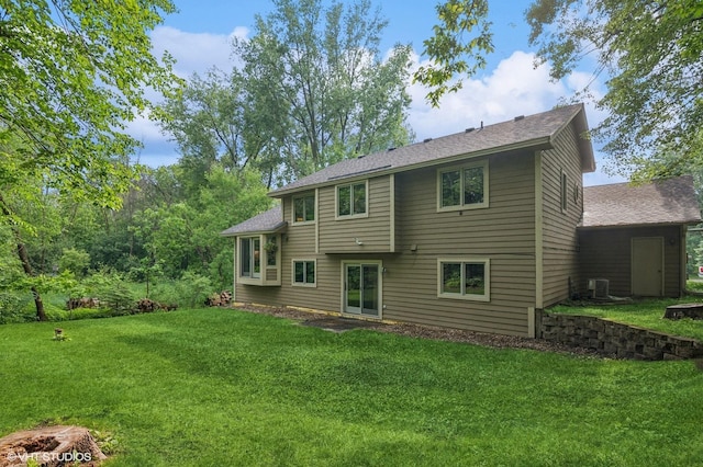 21857 Iden Avenue Pl N, Forest Lake, MN 55025 - rear view of property with cooling unit, a lawn, and a shingled roof