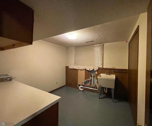 614 8th St E, West Fargo, ND 58078 - office area featuring a textured ceiling and a sink