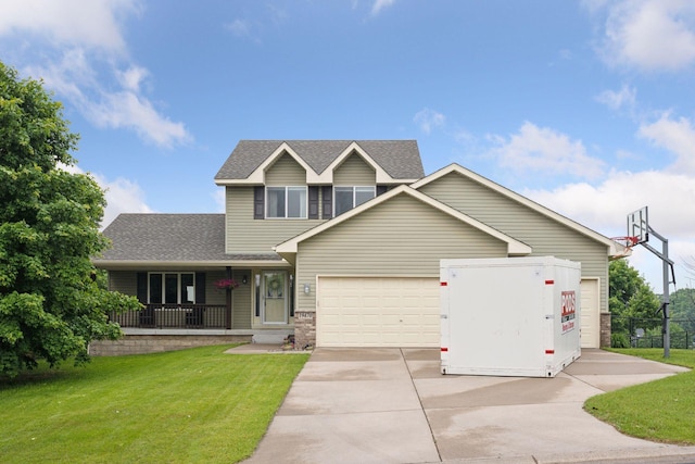 19470 Zumbro Ct NW, Elk River, MN 55330 - view of front of house with a garage, covered porch, driveway, and roof with shingles