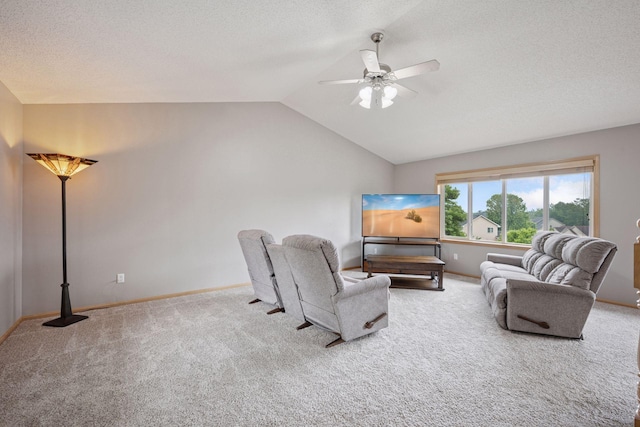 19470 Zumbro Ct NW, Elk River, MN 55330 - carpeted living room featuring a ceiling fan, vaulted ceiling, a textured ceiling, and baseboards