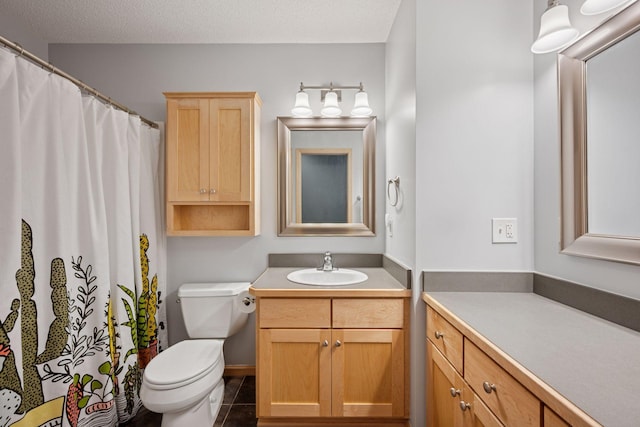 19470 Zumbro Ct NW, Elk River, MN 55330 - bathroom with vanity, toilet, tile patterned flooring, and a shower with curtain