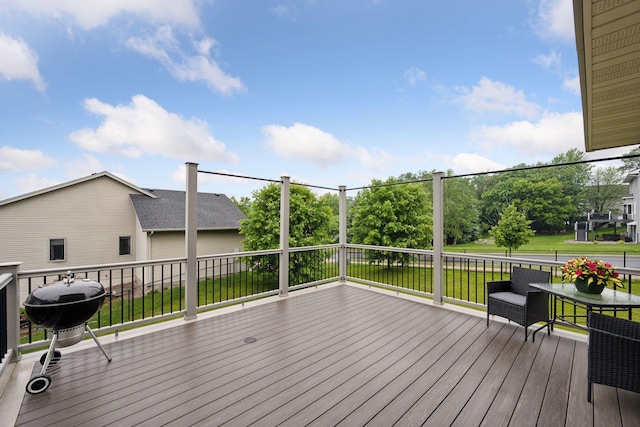 19470 Zumbro Ct NW, Elk River, MN 55330 - wooden terrace featuring a yard