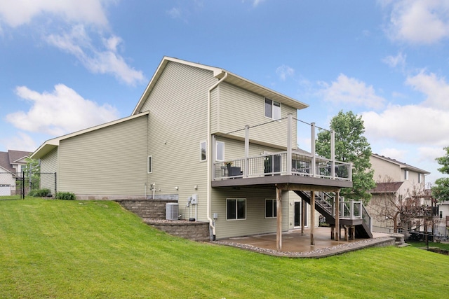 19470 Zumbro Ct NW, Elk River, MN 55330 - rear view of house featuring central AC, a patio area, a wooden deck, and stairs
