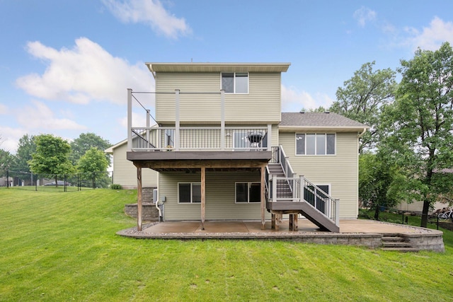 19470 Zumbro Ct NW, Elk River, MN 55330 - rear view of house with a patio, stairs, and a deck