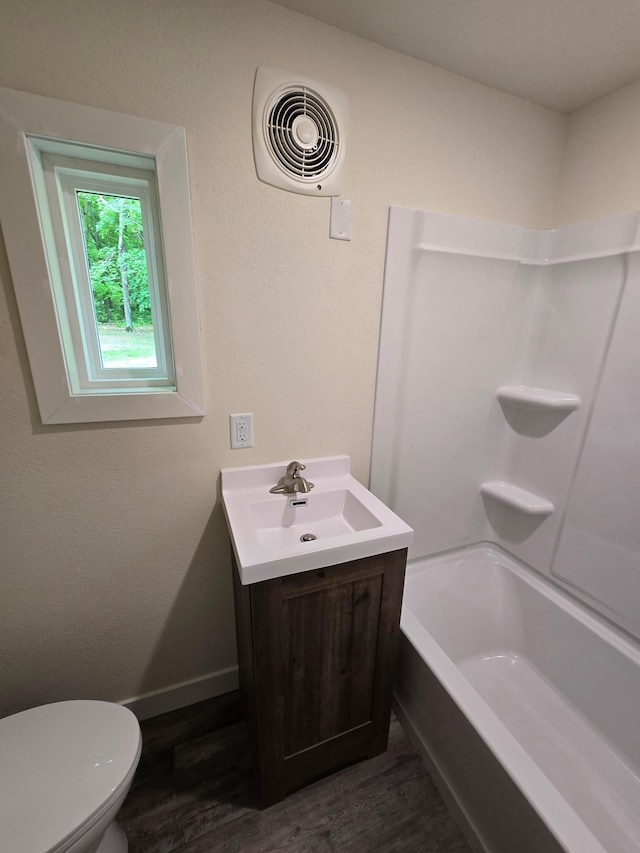 29501 Maplewood Rd Horseshoe, Unit Horseshoe, Callaway, MN 56521 - full bath with wood finished floors, vanity, and shower / bathtub combination