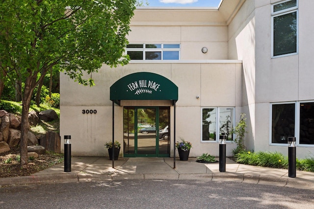 3000 Raleigh Ave Unit 306, Saint Louis Park, MN 55416 - doorway to property with stucco siding